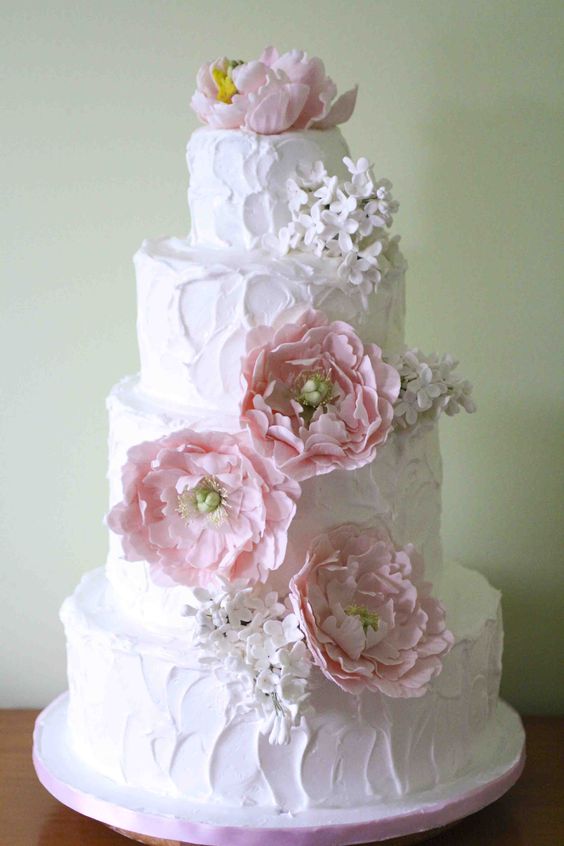 rustic wedding cake with pink peonies