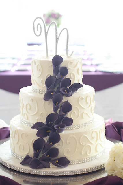 purple calla lilies with buttercream piped scrolls