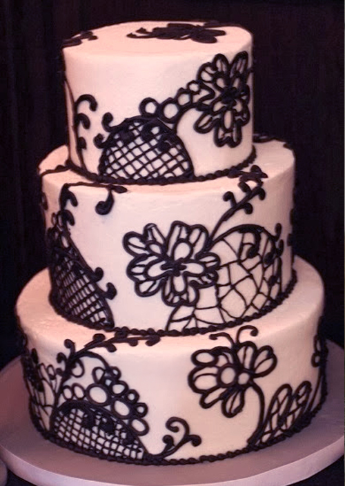 black buttercream piped lace wedding cake