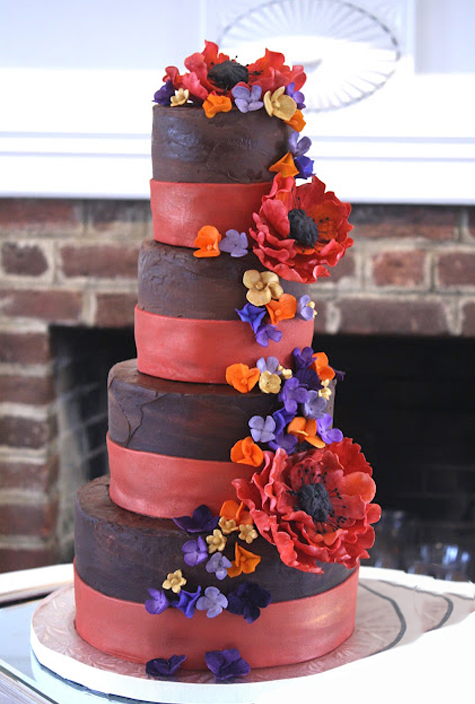 chocolate and red wedding cake with gumpaste flowers