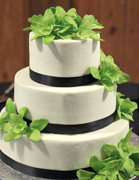 chocolate bands wedding cake with green gumpaste orchids
