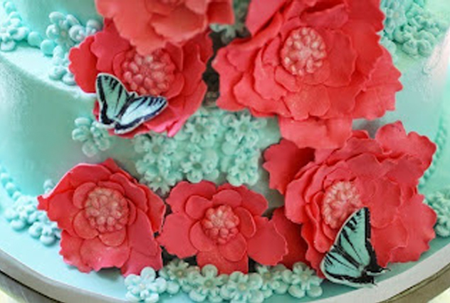 coral and teal wedding cake detail