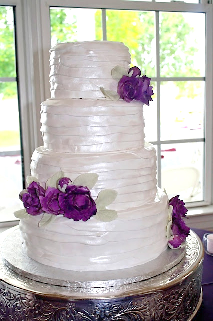 fondant strips cake with purple gumpaste flowers