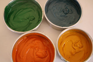 pans with colored batter