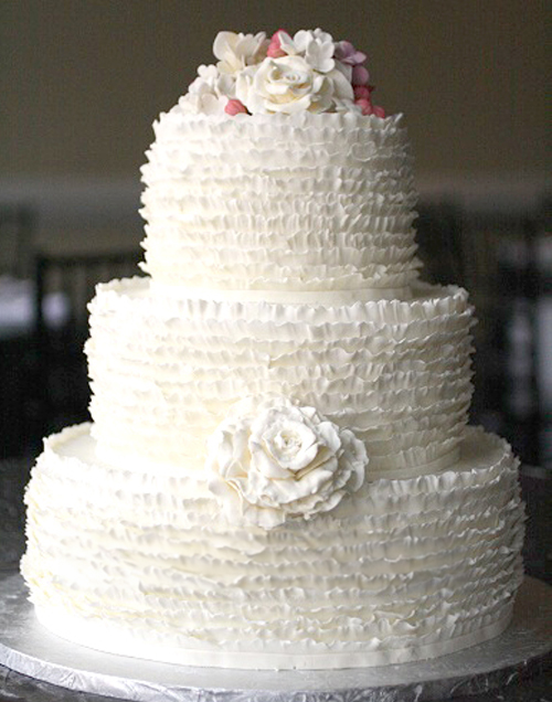 white ruffle wedding cake
