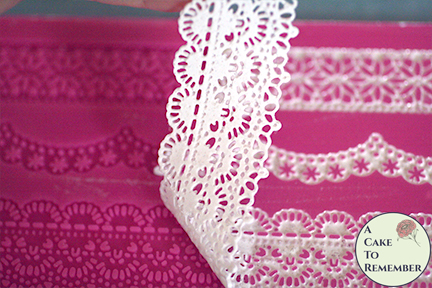 removing the cake lace from the lace mat