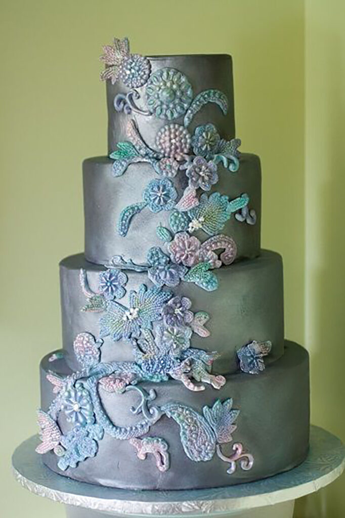 silver and pastel beaded lace wedding cake