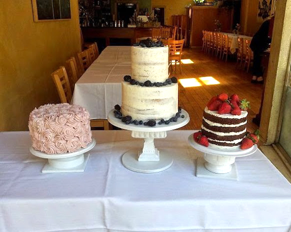 three wedding cakes display