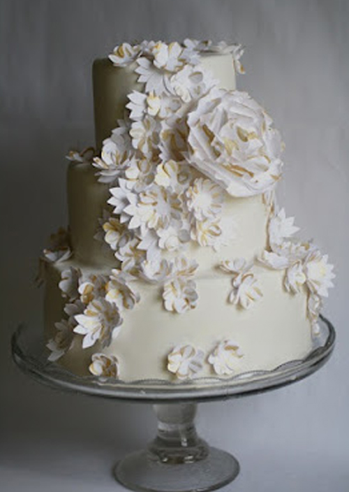wedding cake with white paper flowers
