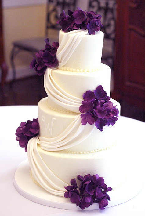 white fondant draping cake with purple gumpste hydrangeas