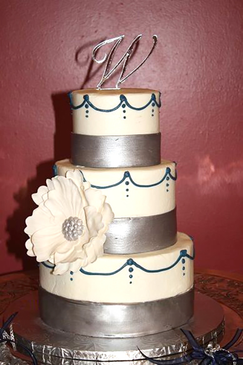 silver bands wedding cake with white gumpaste flower