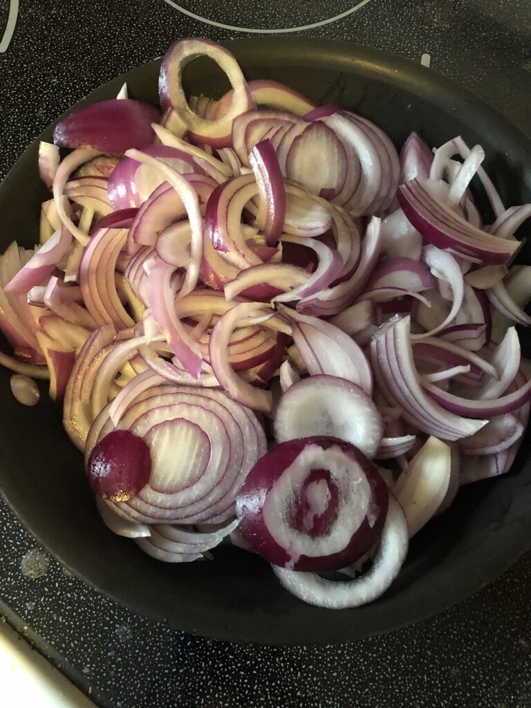 onions in a frying pan
