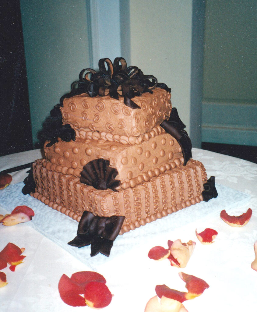 ganache square tiers wedding cake with chocolate bows