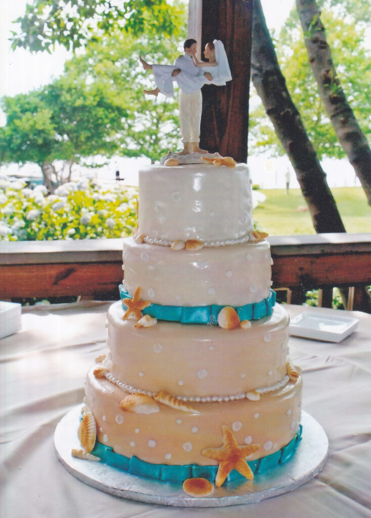 orange ombre beach themed wedding cake