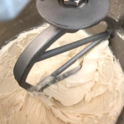 royal icing on a mixing bowl beater