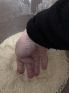 punching the dough down