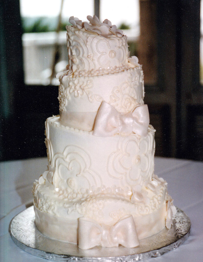 crooked cake white wedding cake topsy turvy