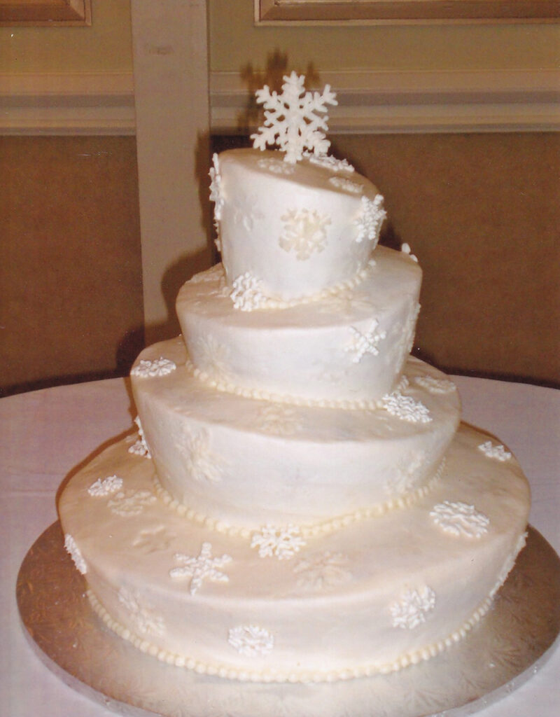 crooked snowflake cake topsy turvy wedding cake