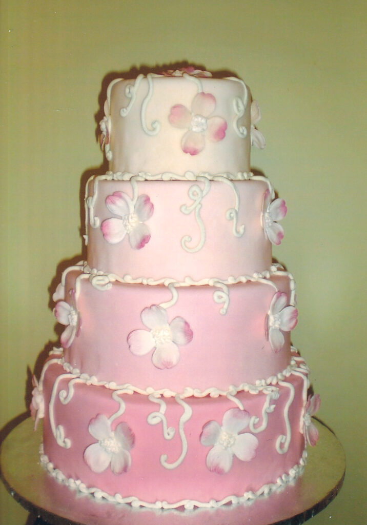 pink ombre wedding cake with gumpaste dogwoods