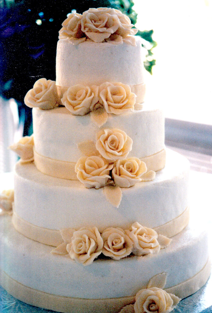 wedding cake with white chocolate roses