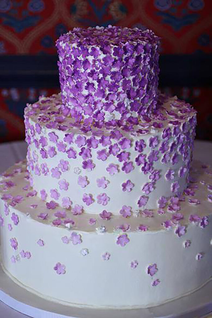 tiny purple flowers wedding cake