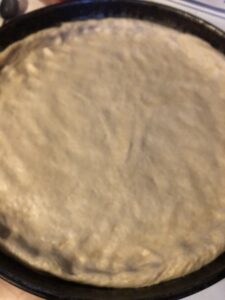 pizza dough in the pan