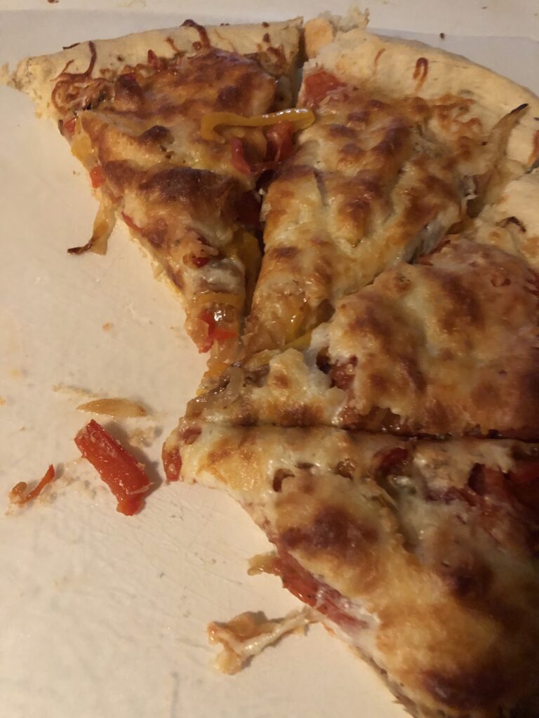 baked and cut pizza