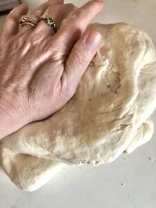 pressing the air out of the dough