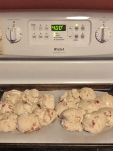 feta and bacon dinner rolls proofing on the stove