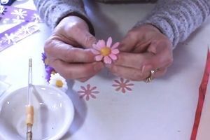 adding petals to a wafer paper daisy