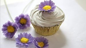 wafer paper daisies on a cupcake