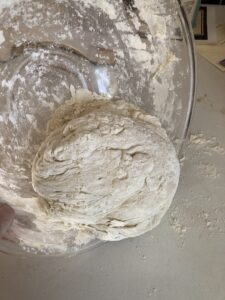 turn the ball of dough out onto the counter