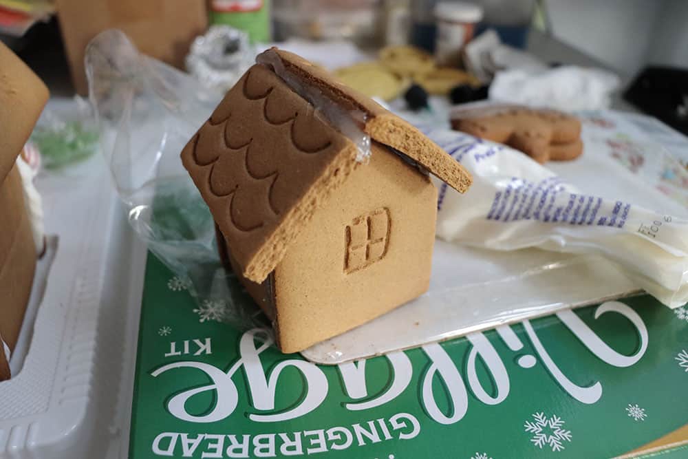 gingerbread house kit put together with hot glue