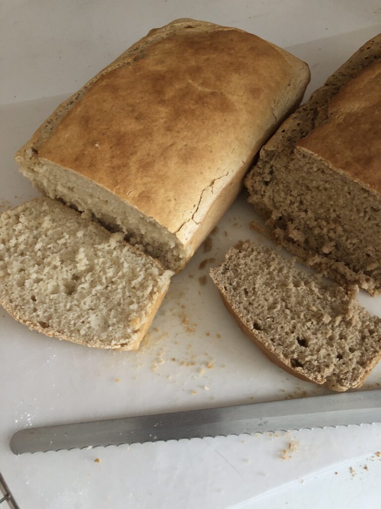 beer bread loaves with the ends cut off to show the different color of the breads