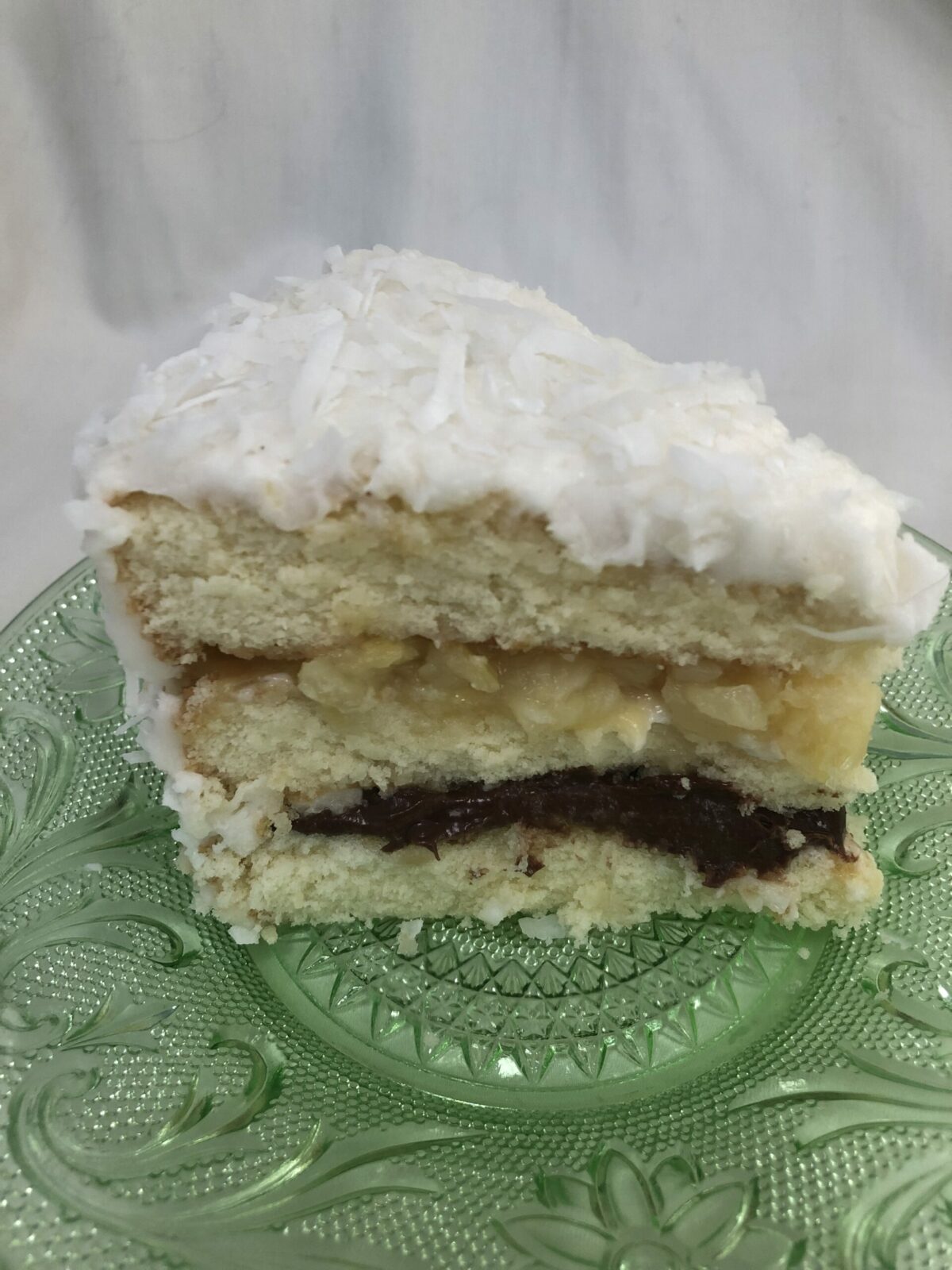 coconut cake with pineapple and chocolate fillings