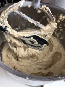 nut cake batter in a mixer bowl