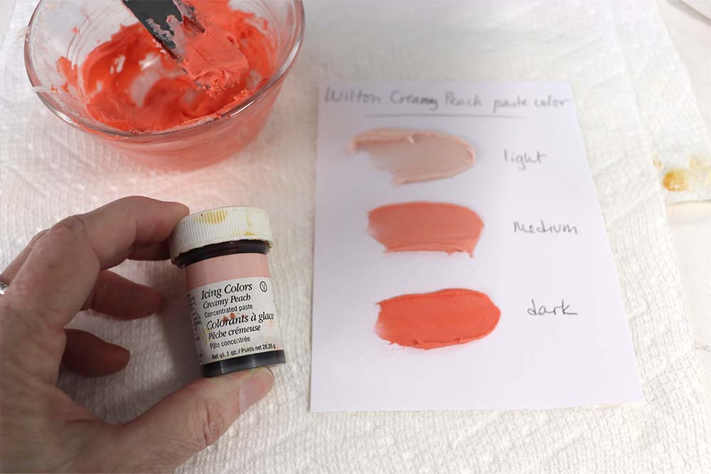 creamy peach wilton food coloring in icing
