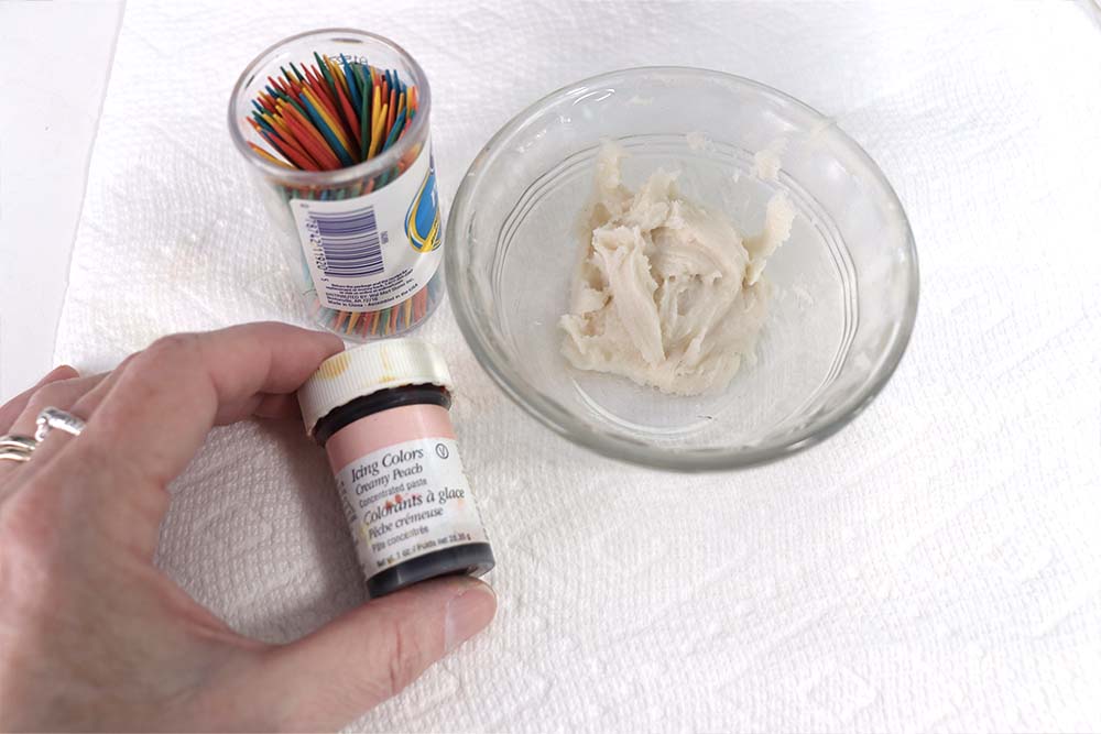 creamy peach wilton food coloring in icing