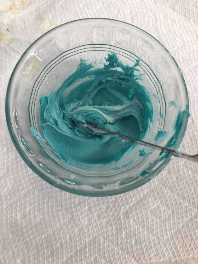 Americolor teal food coloring in icing