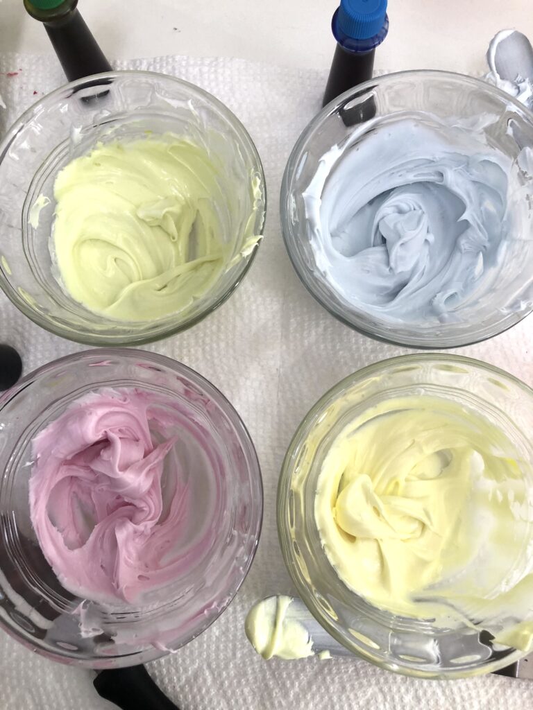 pale pastel icing in dishes